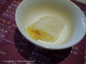 Glutinous Rice Rolls filled with Mango and Dusted with Coconut