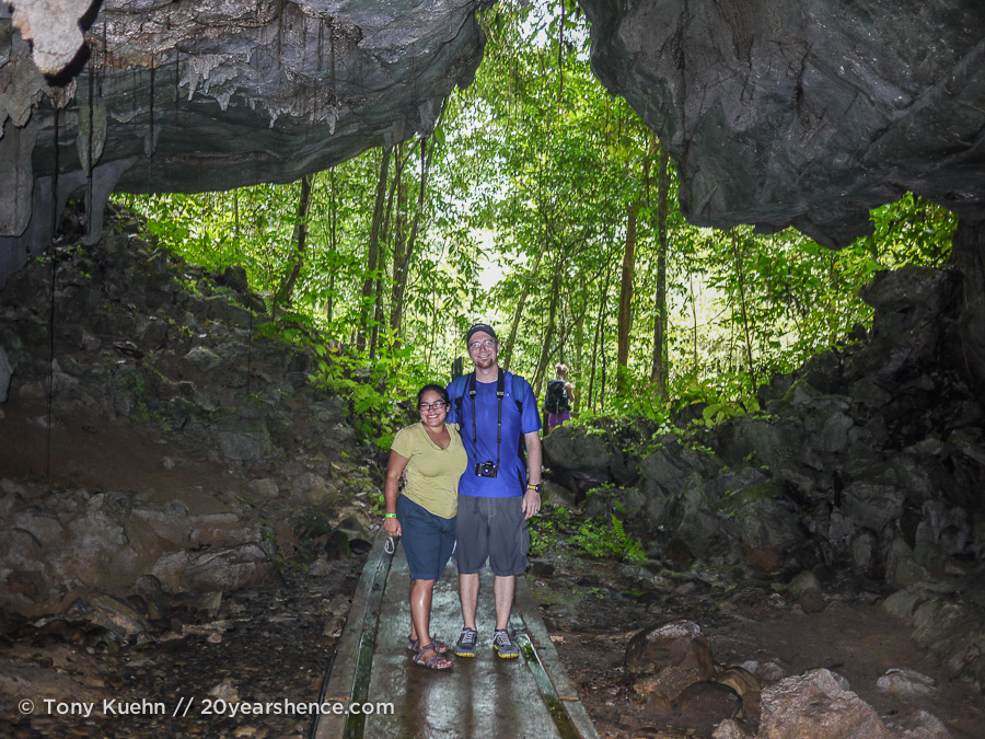 Standing at the mouth of Lang Cave, Mulu National Park