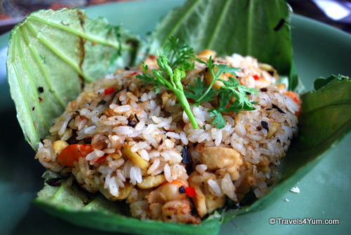 Vietnamese fried rice with lotus seeds and other things cooked in a lotus leaf, made during a cooking class in Saigon