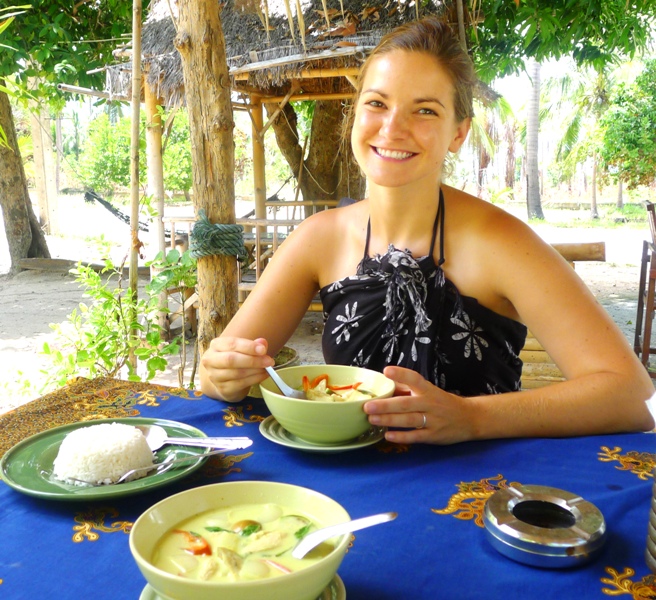 Meg & her favorite food:  Enjoying Green Curry in Thailand
